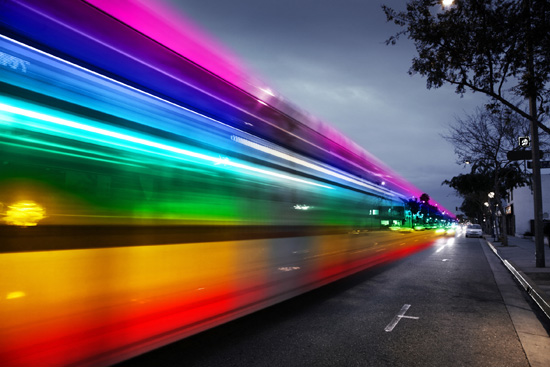 fast moving traffic creates rainbow blur